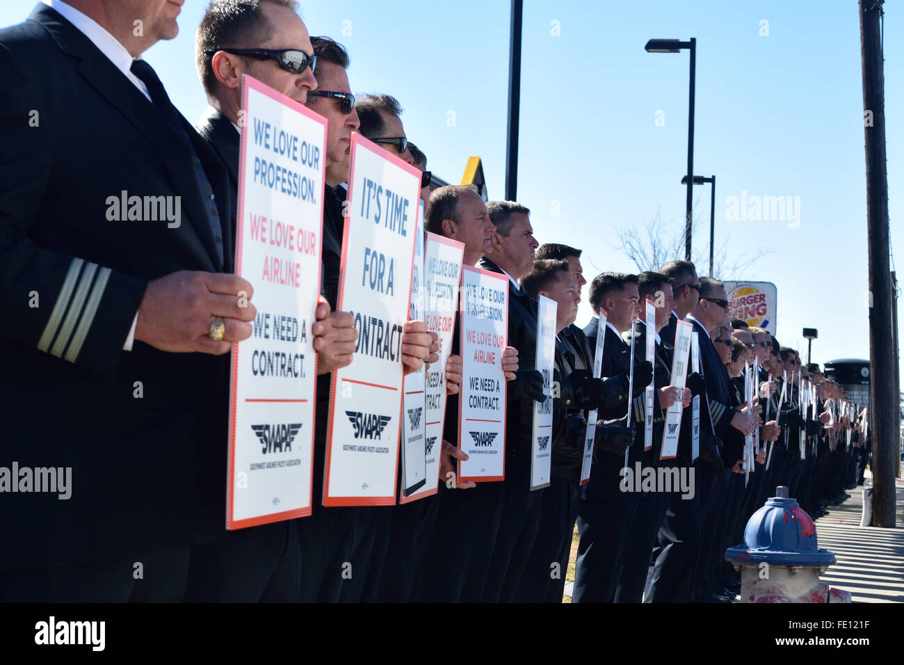 About 100 Southwest Airlines pilots silently protest in support for a contract outside of Love Field Credit:  Brian T. Humek/Alamy Live News Stock Photo