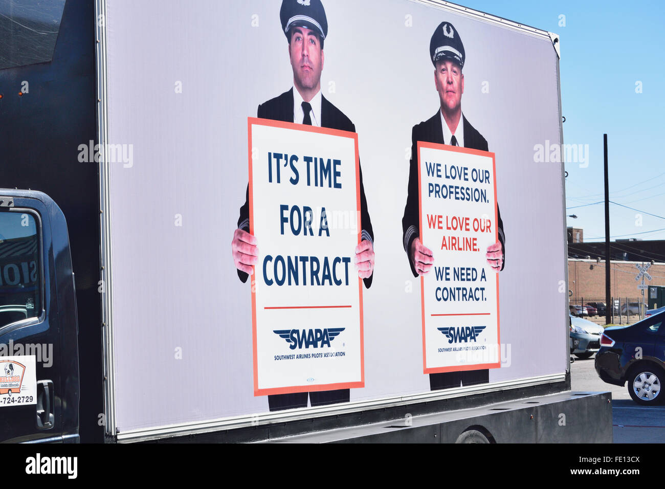 Southwest Airlines Pilots Association rented rolling billboards to drive outside the entrance of Love Field. Credit:  Brian T. Humek/Alamy Live News Stock Photo