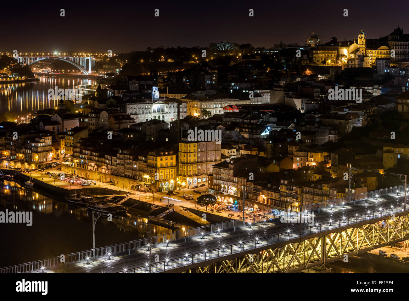 Porto by night.  View of the Dom Luis Bridge over the river Douro and historic part of the city. Stock Photo