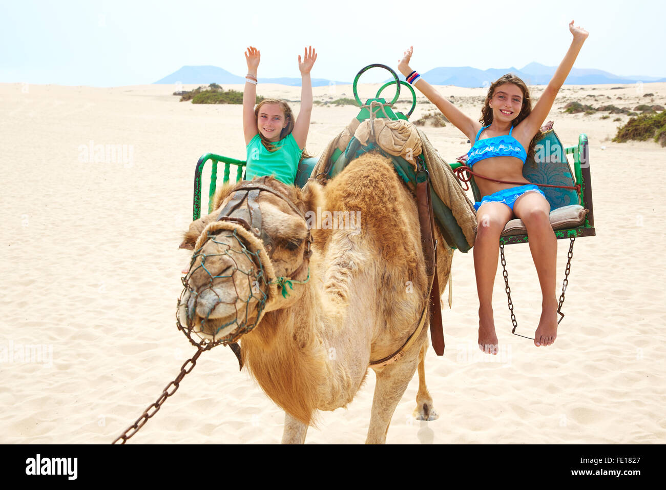 Child girl riding camel in hi-res stock photography and images - Alamy