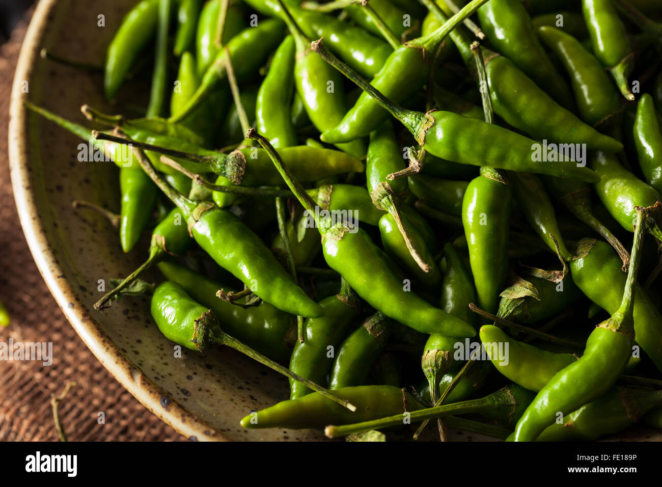 Hot Green Thai Chili Pepper in a Bowl Stock Photo