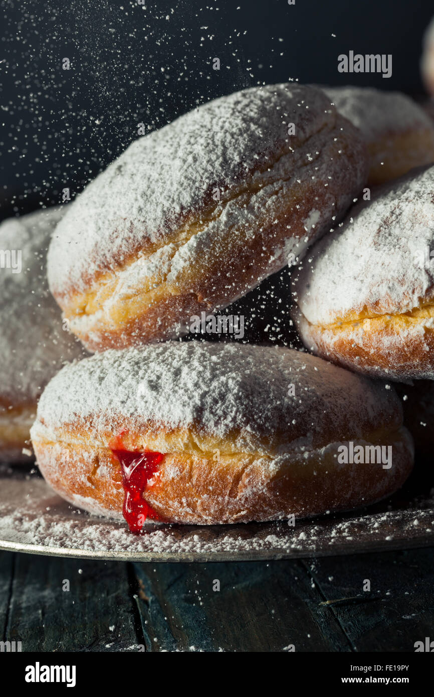 Homemade Sugary Paczki Donut with Cherry Filling Stock Photo