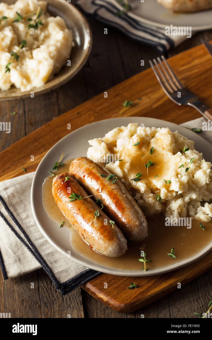Homemade Bangers and Mash with Herbs and Gravy Stock Photo Alamy