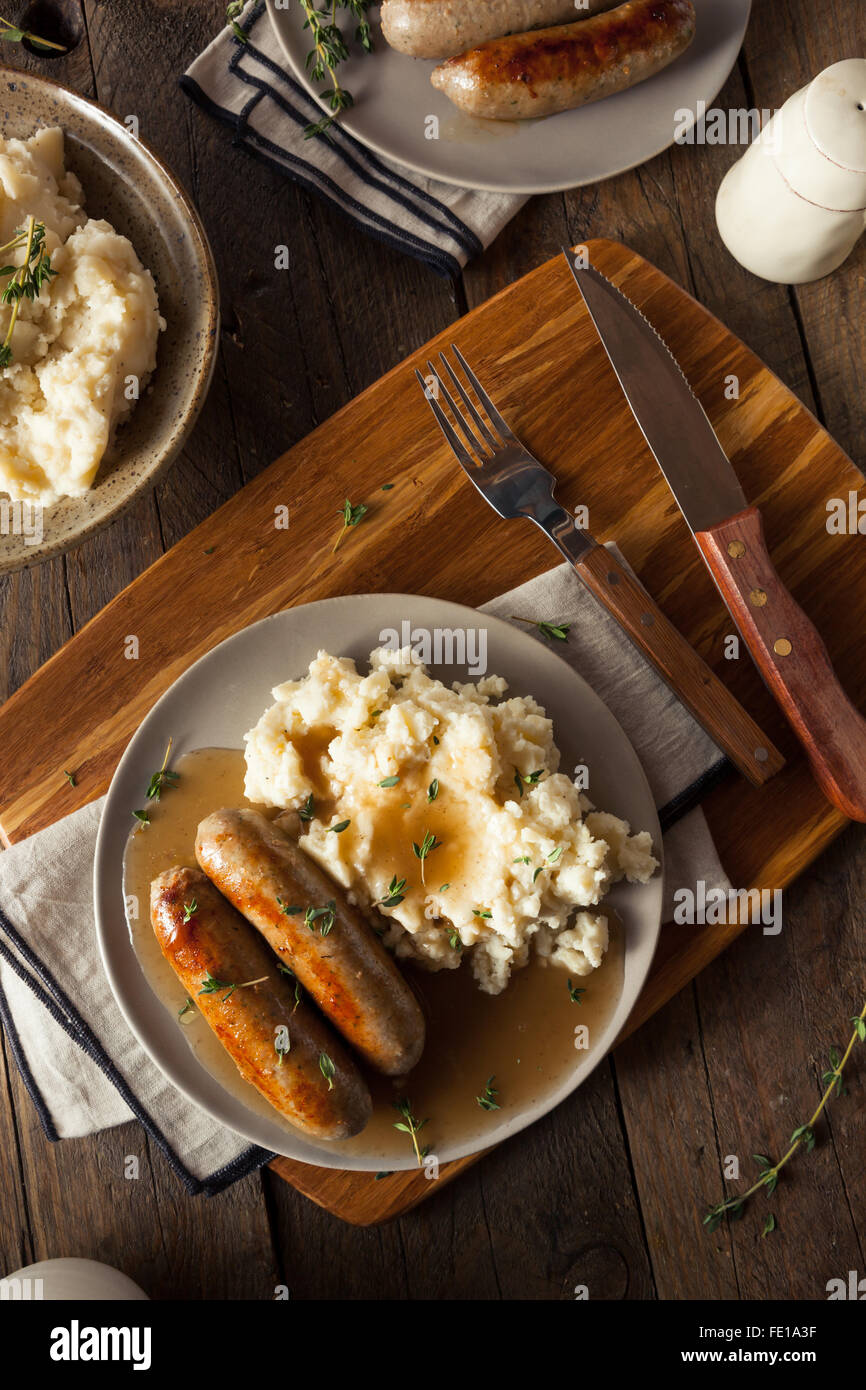 Homemade Bangers and Mash with Herbs and Gravy Stock Photo Alamy