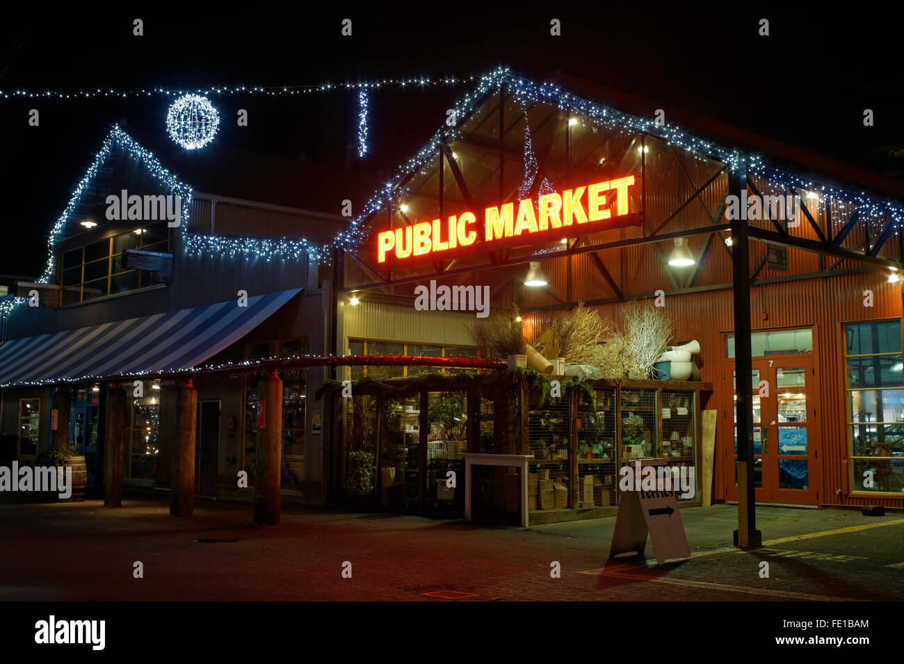 Granville Island Public Market building decorated with Christmas lights