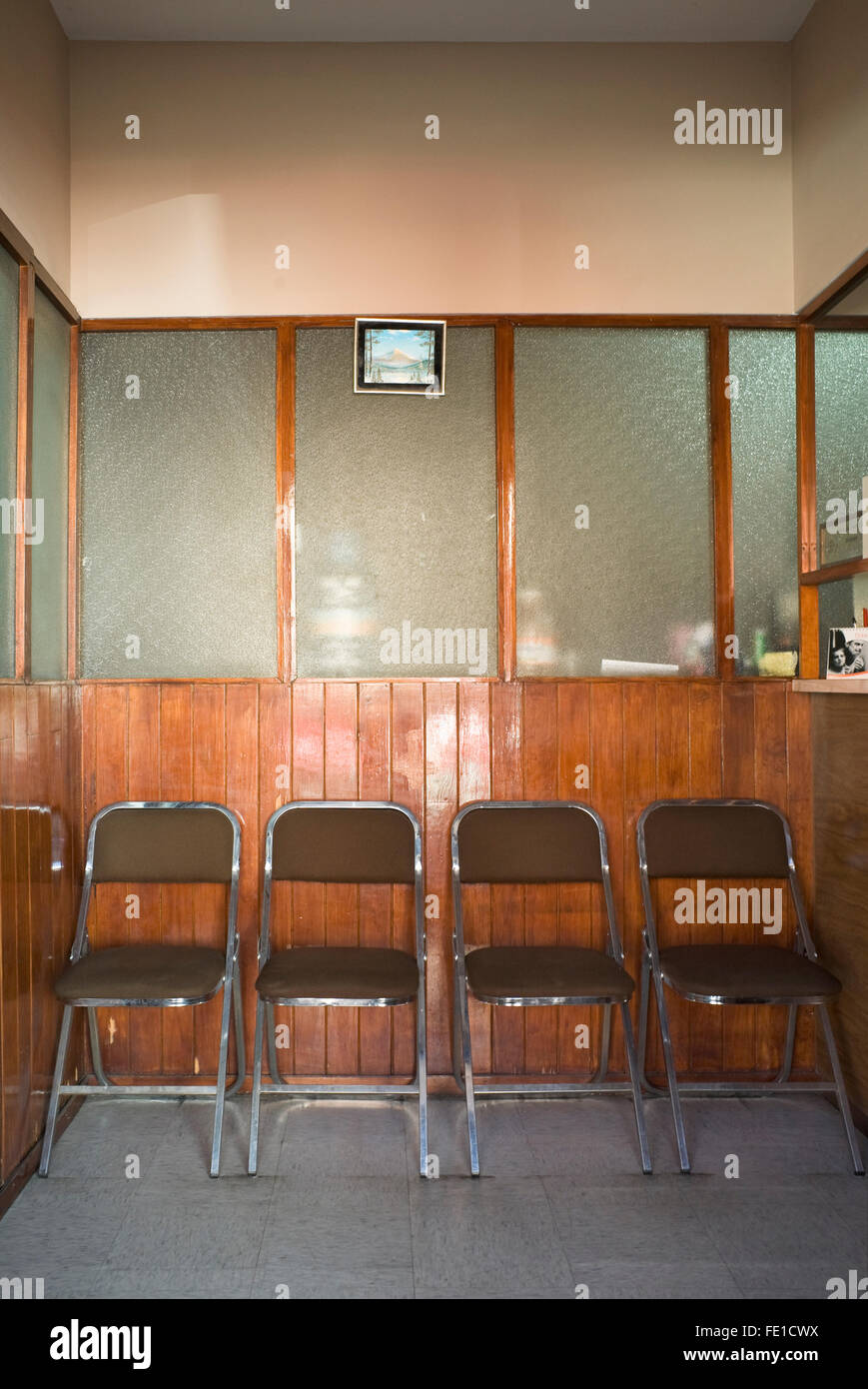 Empty Medical Clinic Waiting Room With Small Uncomfortable