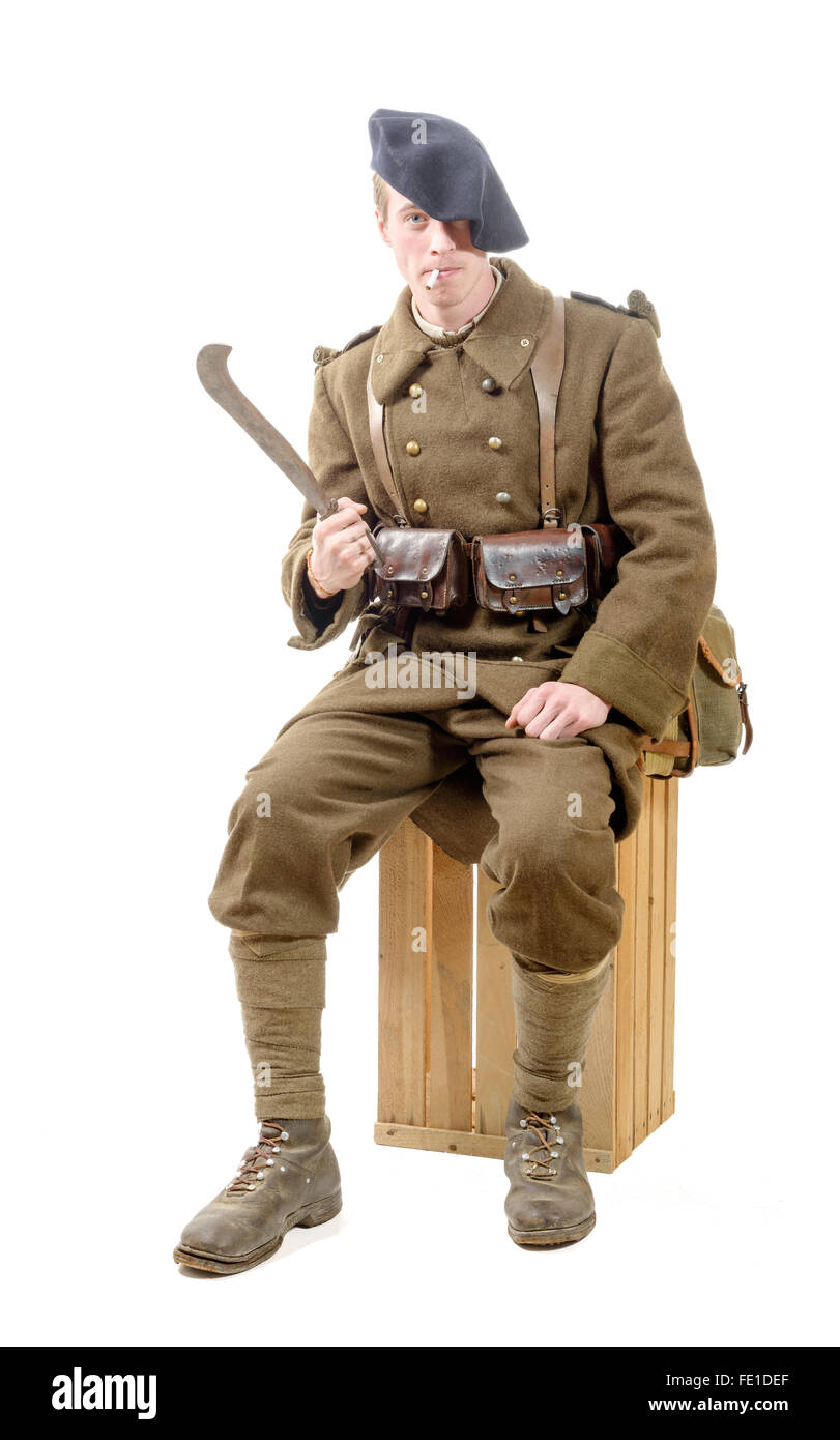 a French soldier 40s smoke a cigarette on the white background Stock Photo