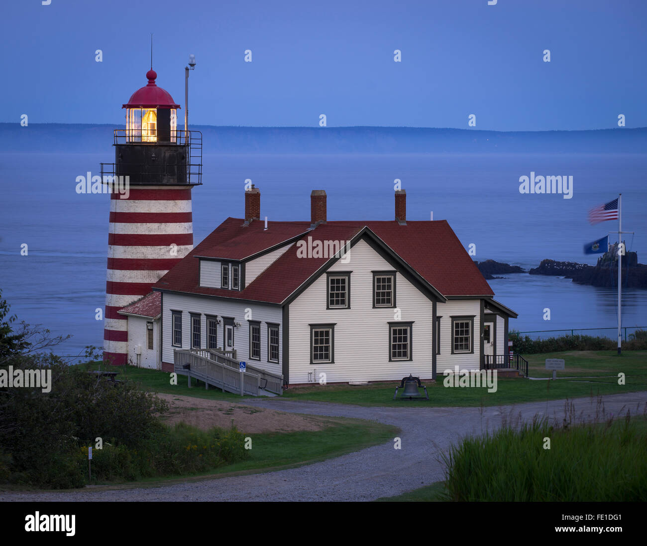 Lubec, Maine: West Quoddy Head Light at dusk Stock Photo