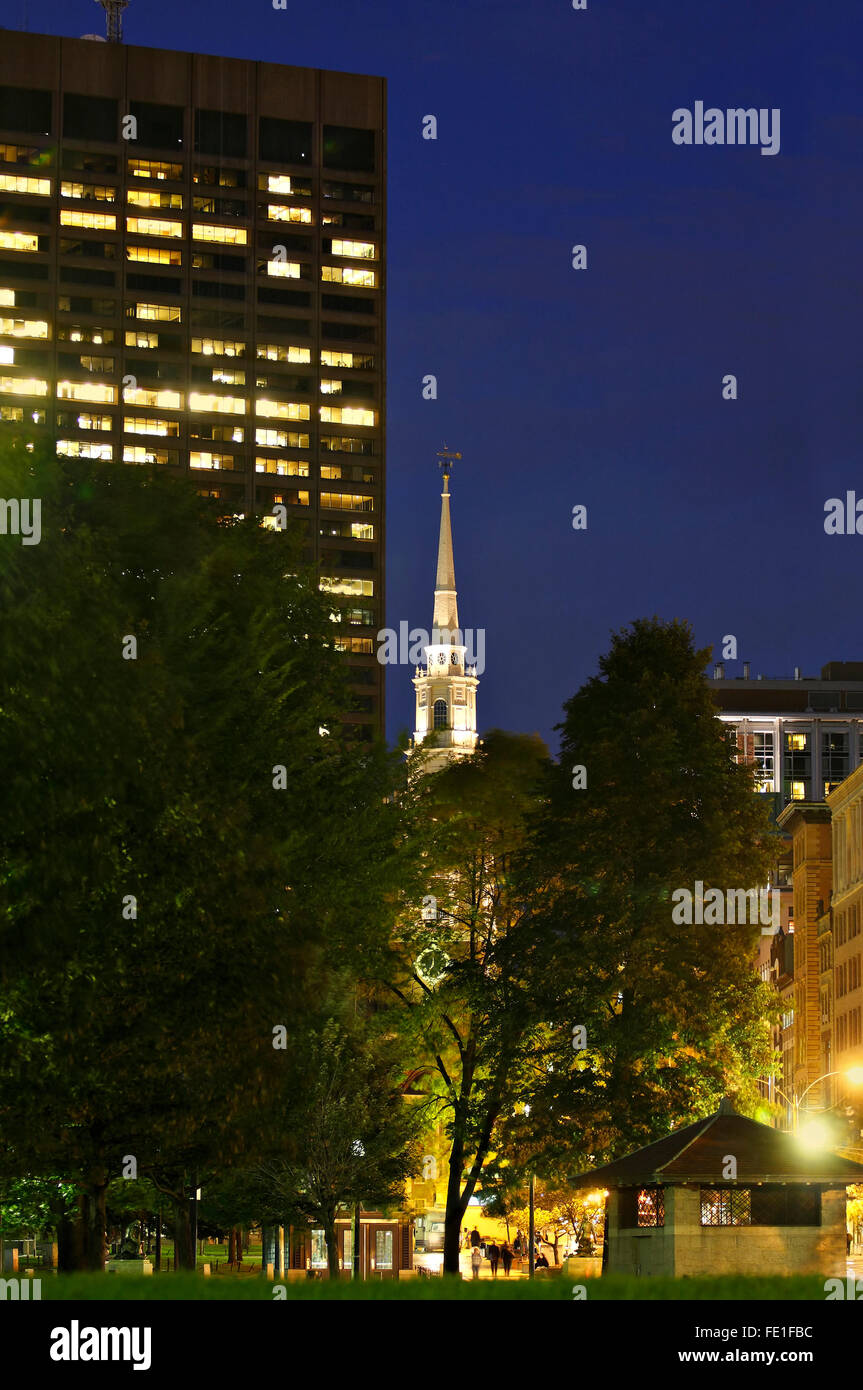 Park Street Church steeple in Boston Massachusetts as seen from inside Boston Common on a breezy Summer night Stock Photo