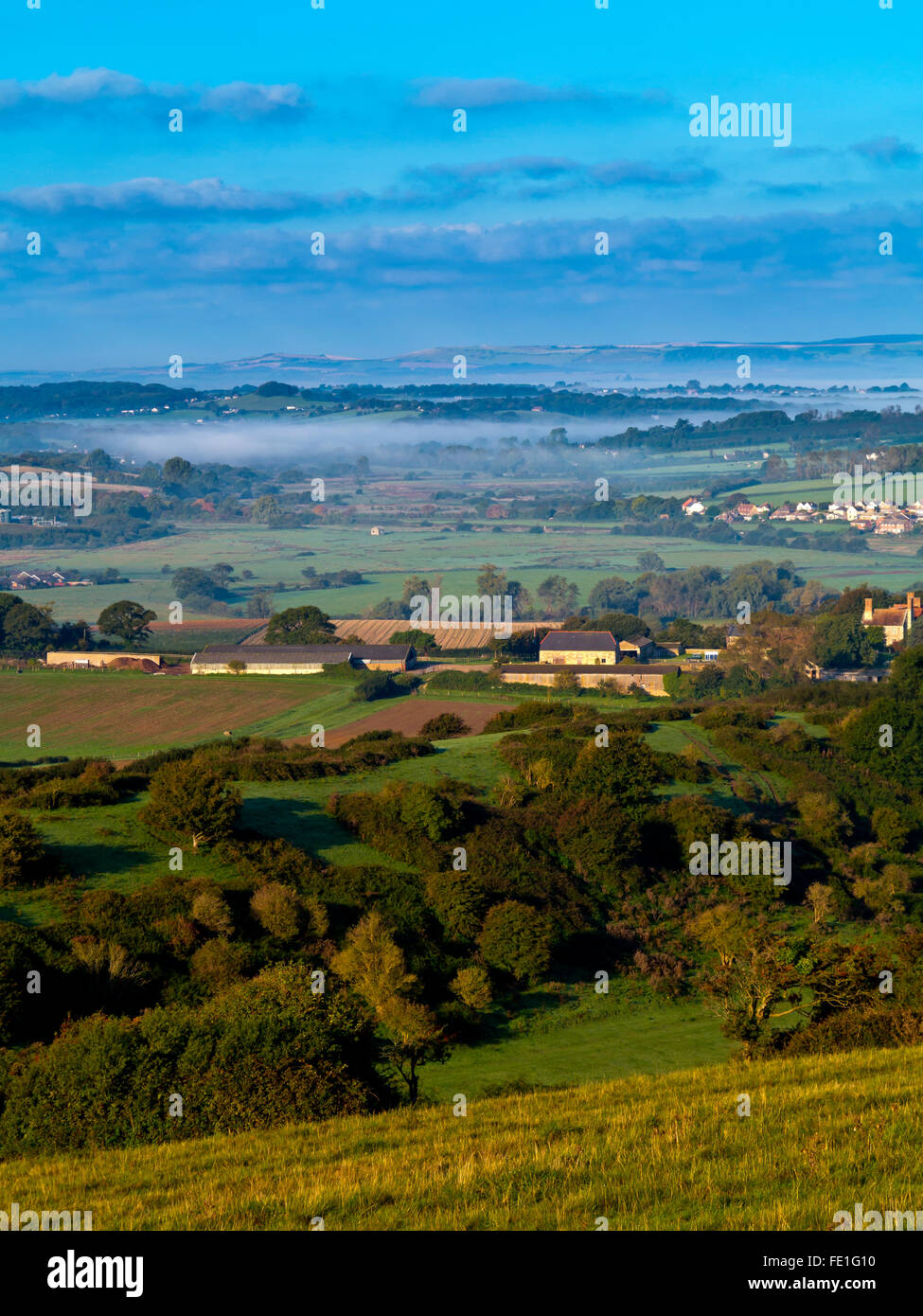 View of rural countryside of the eastern part of the Isle of Wight in southern England UK on a misty late summer morning Stock Photo