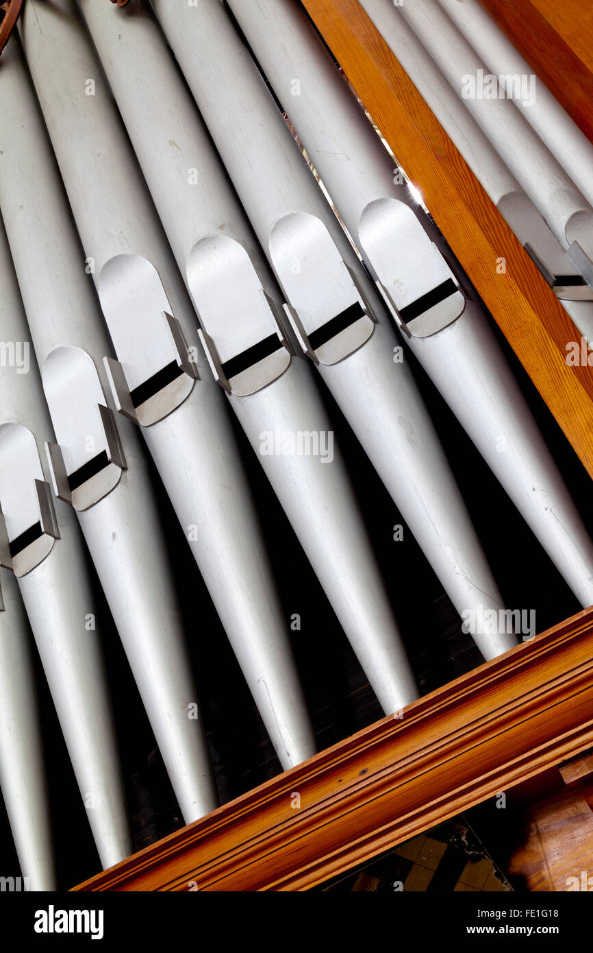 Detail of metal pipes on a traditional church organ used to amplify the