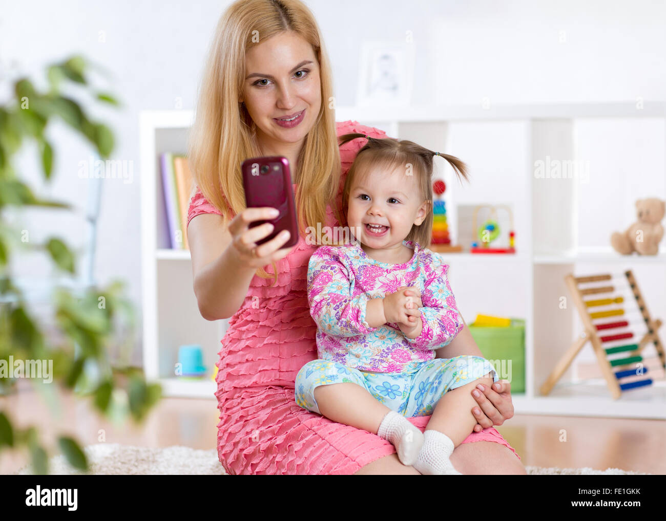 Mother and daughter taking selfie Stock Photo Alamy