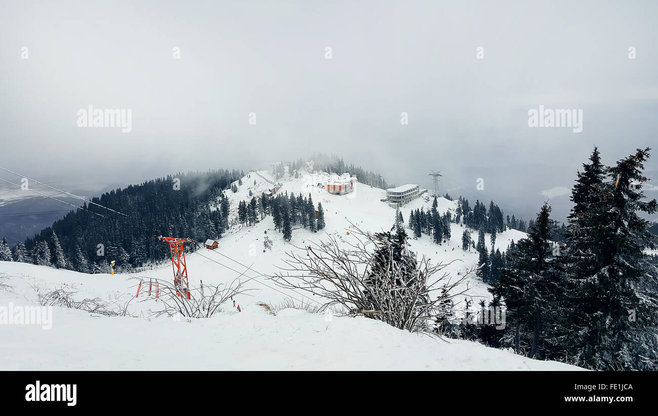 Panoramic view from mount in winter season. Touristic base in Brasov, Romania Stock Photo