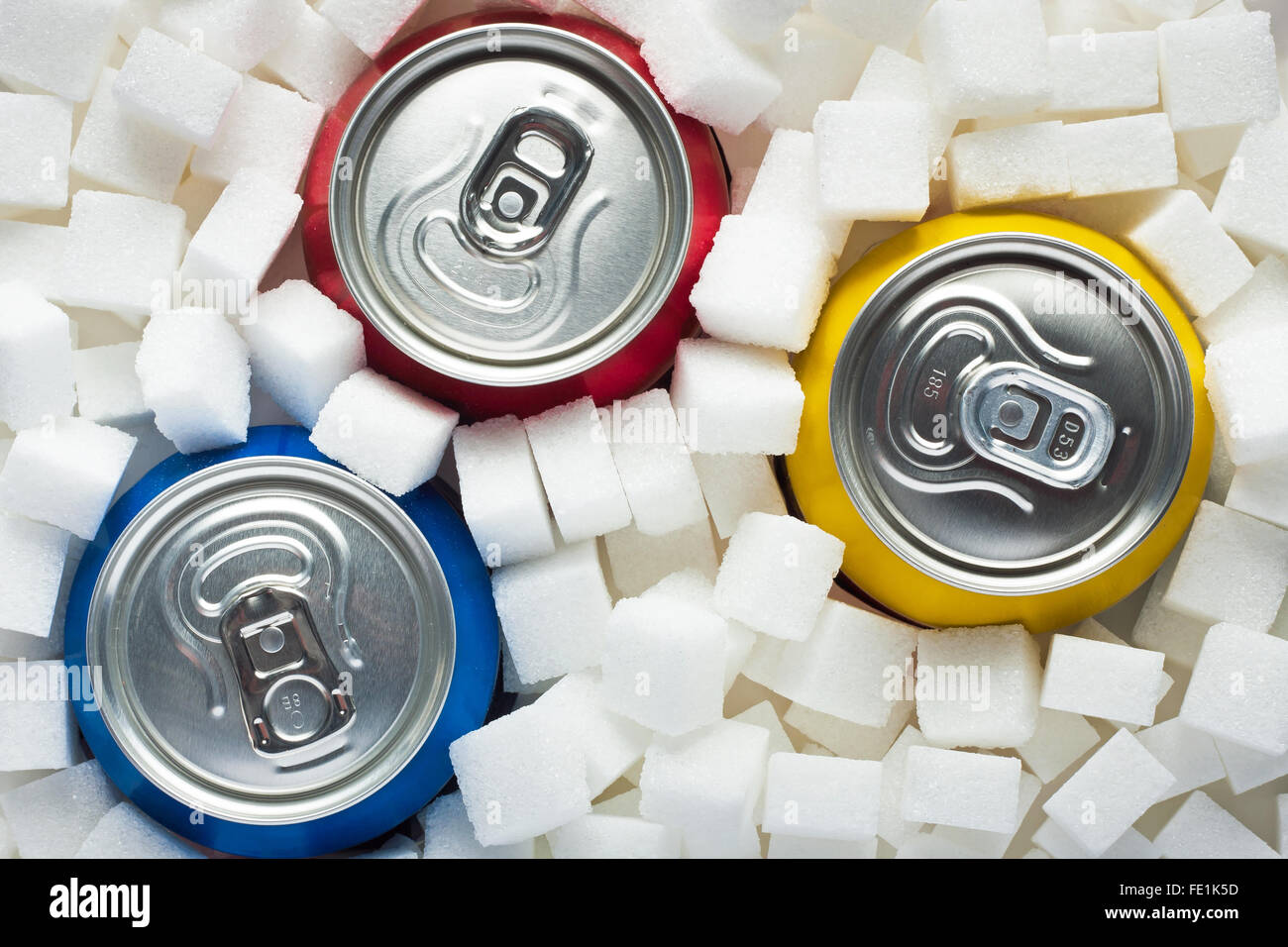 Unhealthy food concept sugar in carbonated drinks. Sugar cubes as