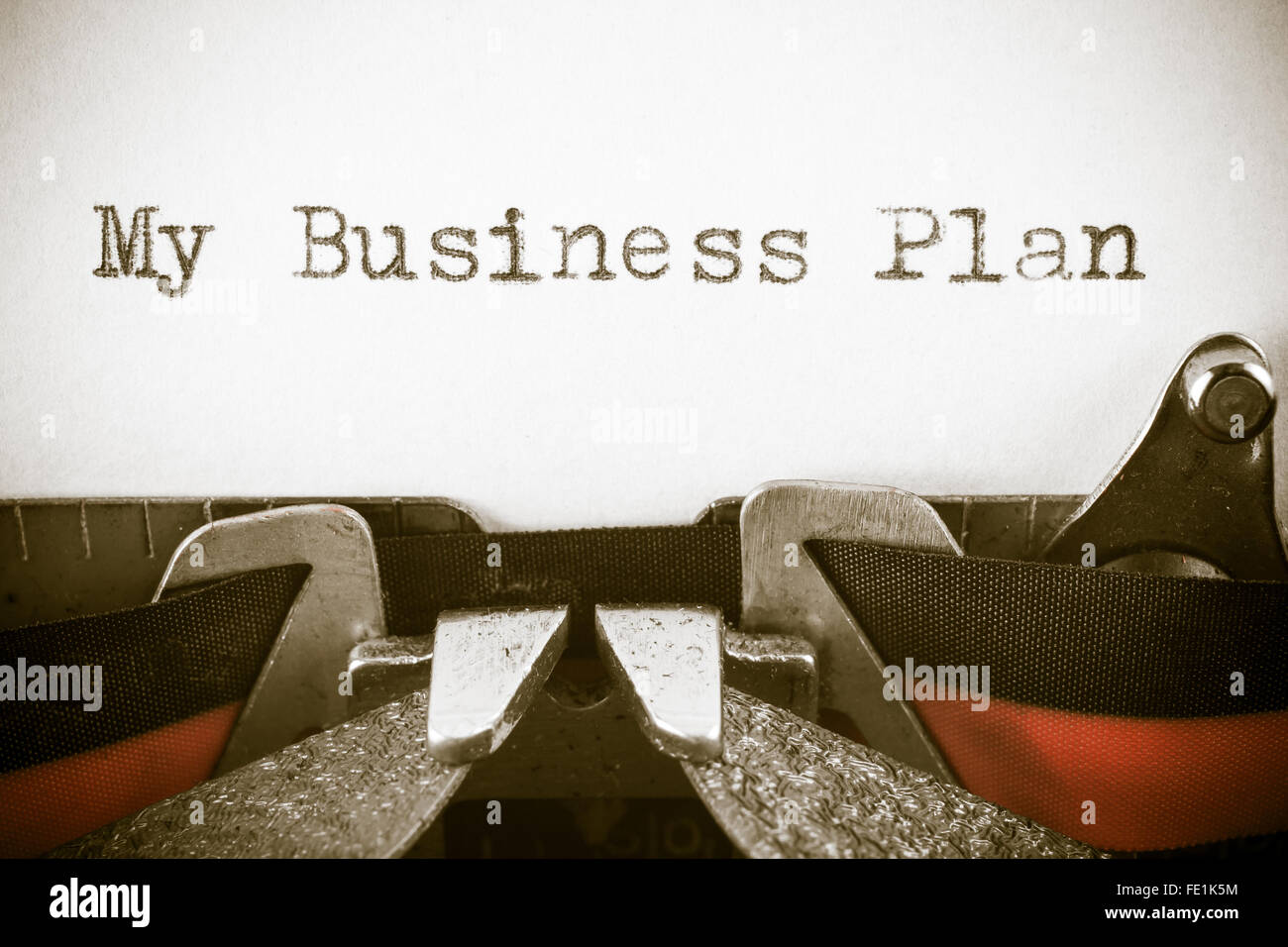 My business plan on typewriter. Photo in vintage style Stock Photo
