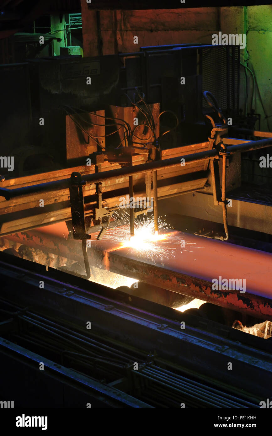 Gas cutting of the hot steel metal in a plant Stock Photo