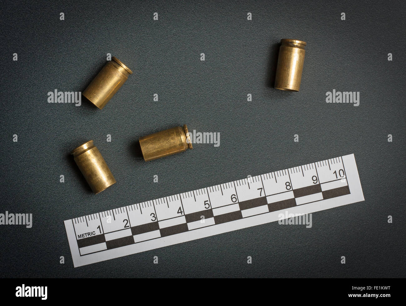 Crime scene, empty bullets casings on ground Stock Photo