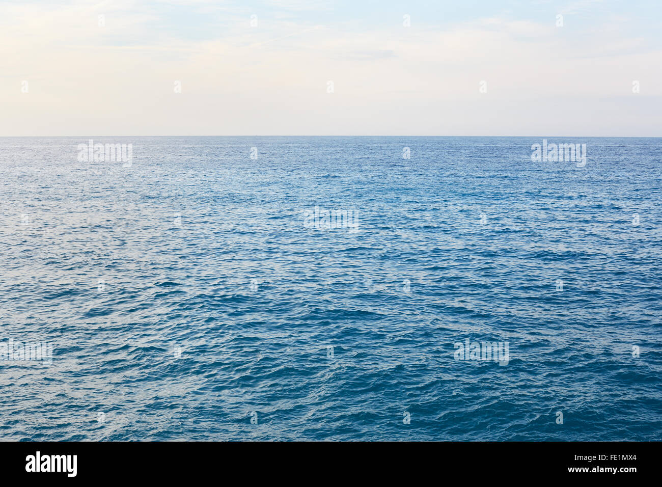 Mediterranean blue, calm sea with horizon in the morning Stock Photo