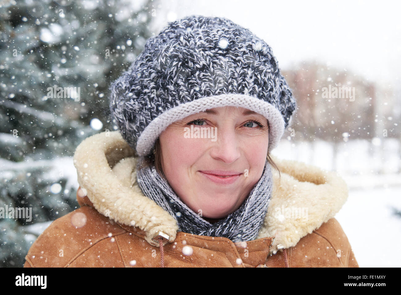 Woman portrait at winter season with snowy fir trees Stock Photo - Alamy