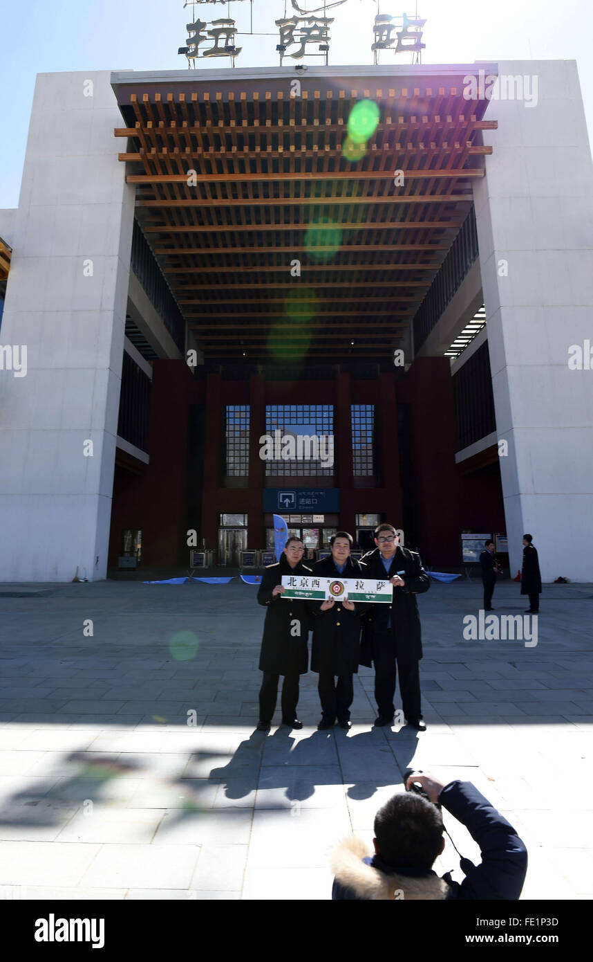 Beijing, China's Tibet Autonomous Region. 3rd Feb, 2016. Crew members pose for a photo at the Railway State in Lhasa, capital of southwest China's Tibet Autonomous Region, on Feb. 3, 2016. The Z21/22 train will readjusted to interlink Shenyang, capital of northeast China's Liaoning Province, to Lhasa on February. The Z21/22 train, which started operation on July 1 in 2006, has carried 9.9 million passengers by Feb. 1 of 2016. © Tang Zhaoming/Xinhua/Alamy Live News Stock Photo