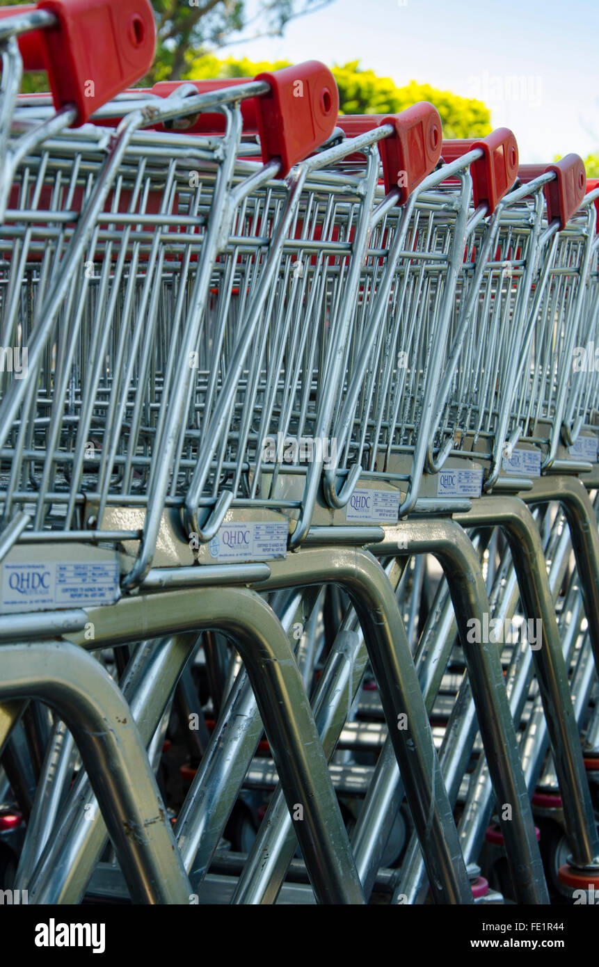 A close up of numerous supermarket shopping trolleys in Australia Stock