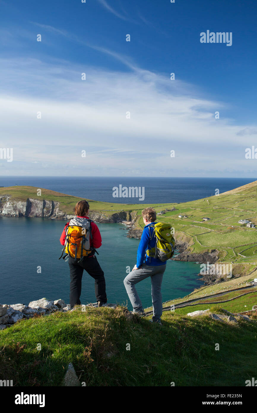 Walkers on the Dingle Way above Slea Head, Dingle Peninsula, County Kerry, Ireland. Stock Photo