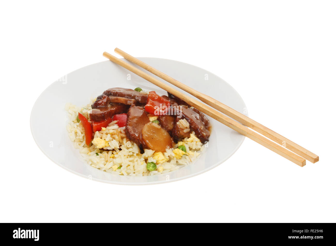 Chinese meal, duck in plum sauce with egg fried rice in a bowl with chopsticks isolated against white Stock Photo