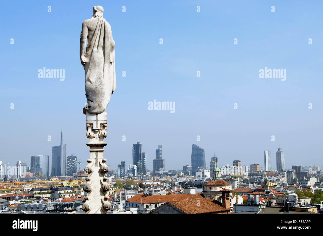 New skyline of Milan.View from the top of the Duomo. In the foreground the houses of the old town. In the background the new sky Stock Photo