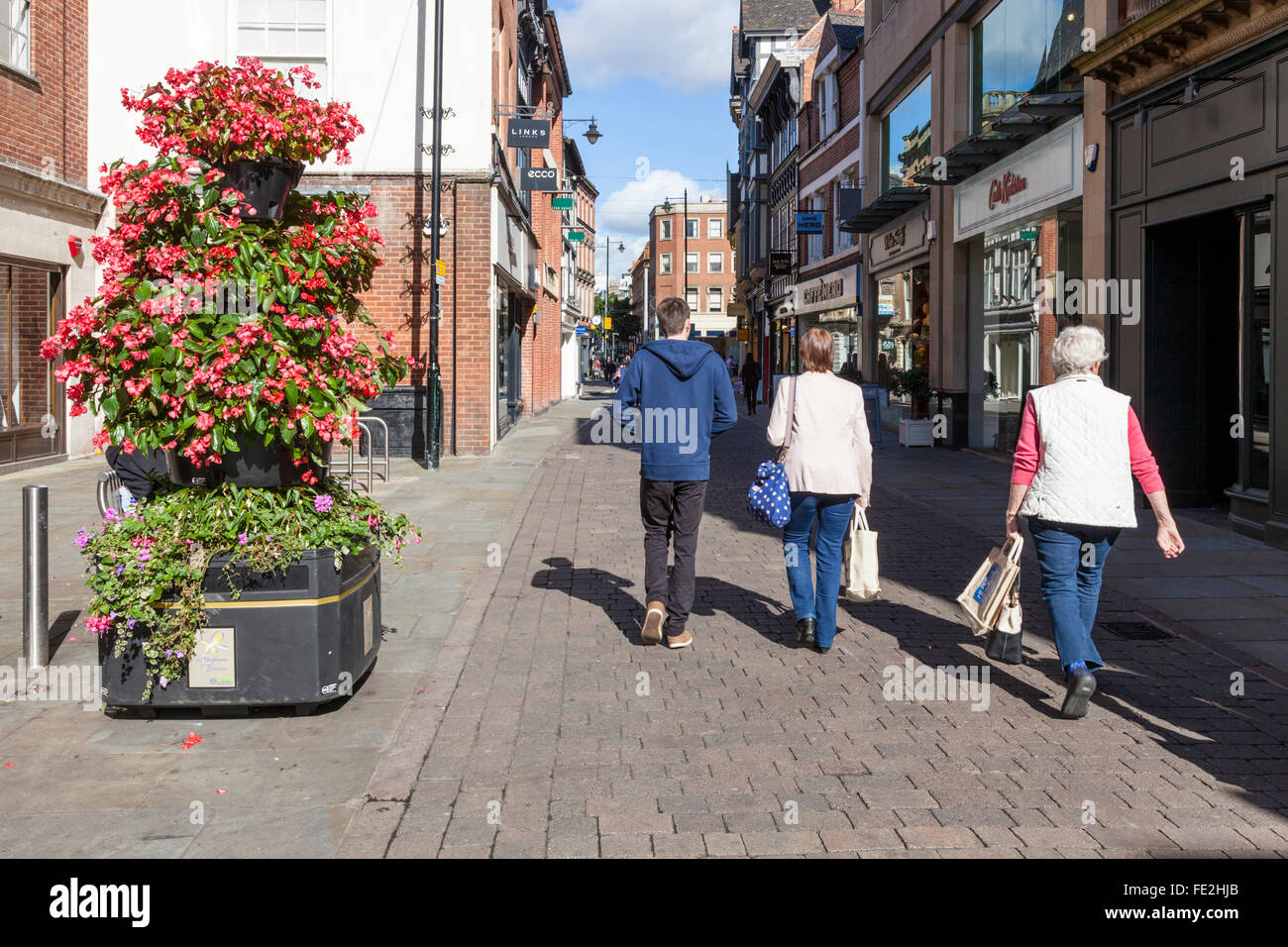 People shopping on a pedestrianised street. Bridlesmith Gate, Nottingham city centre, England, UK Stock Photo
