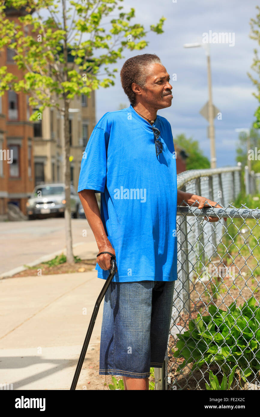 Man with Traumatic Brain Injury relaxing in the city Stock Photo - Alamy