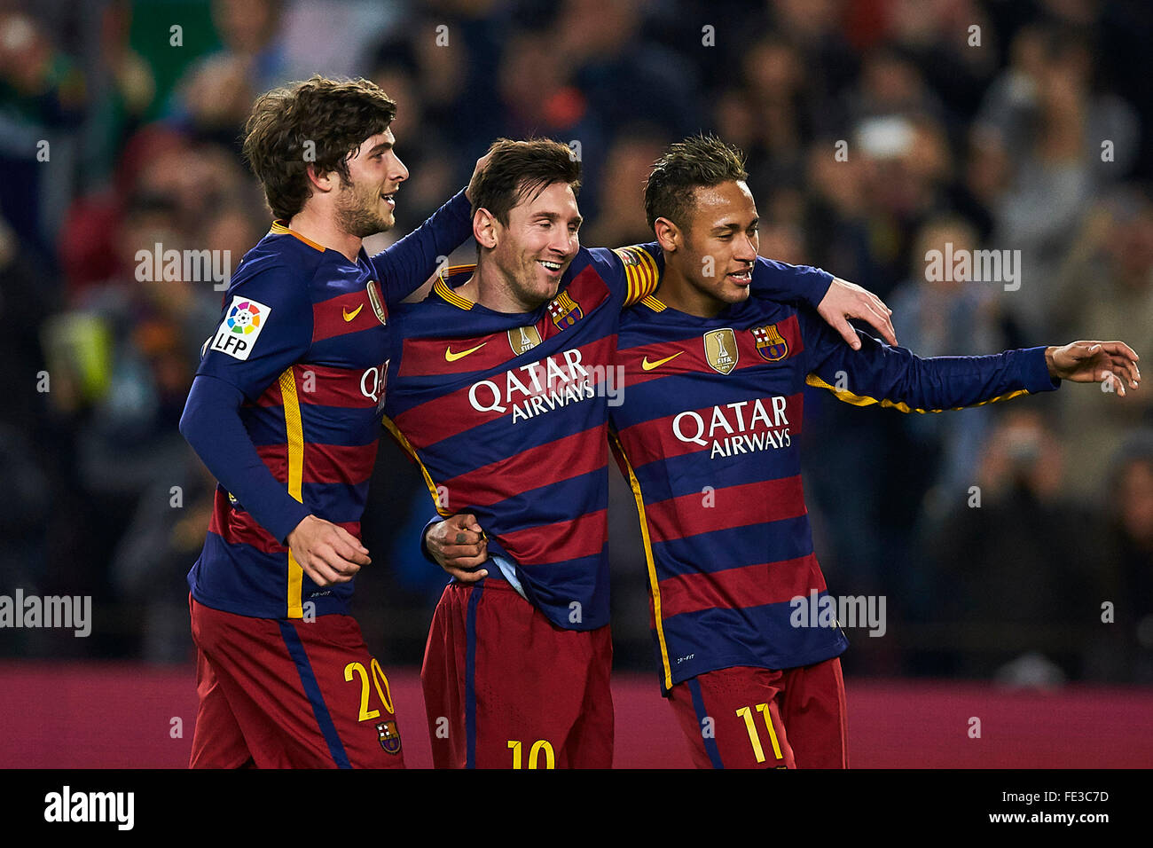 Lionel Messi (FC Barcelona) celebrates with his teammate Sergi Roberto