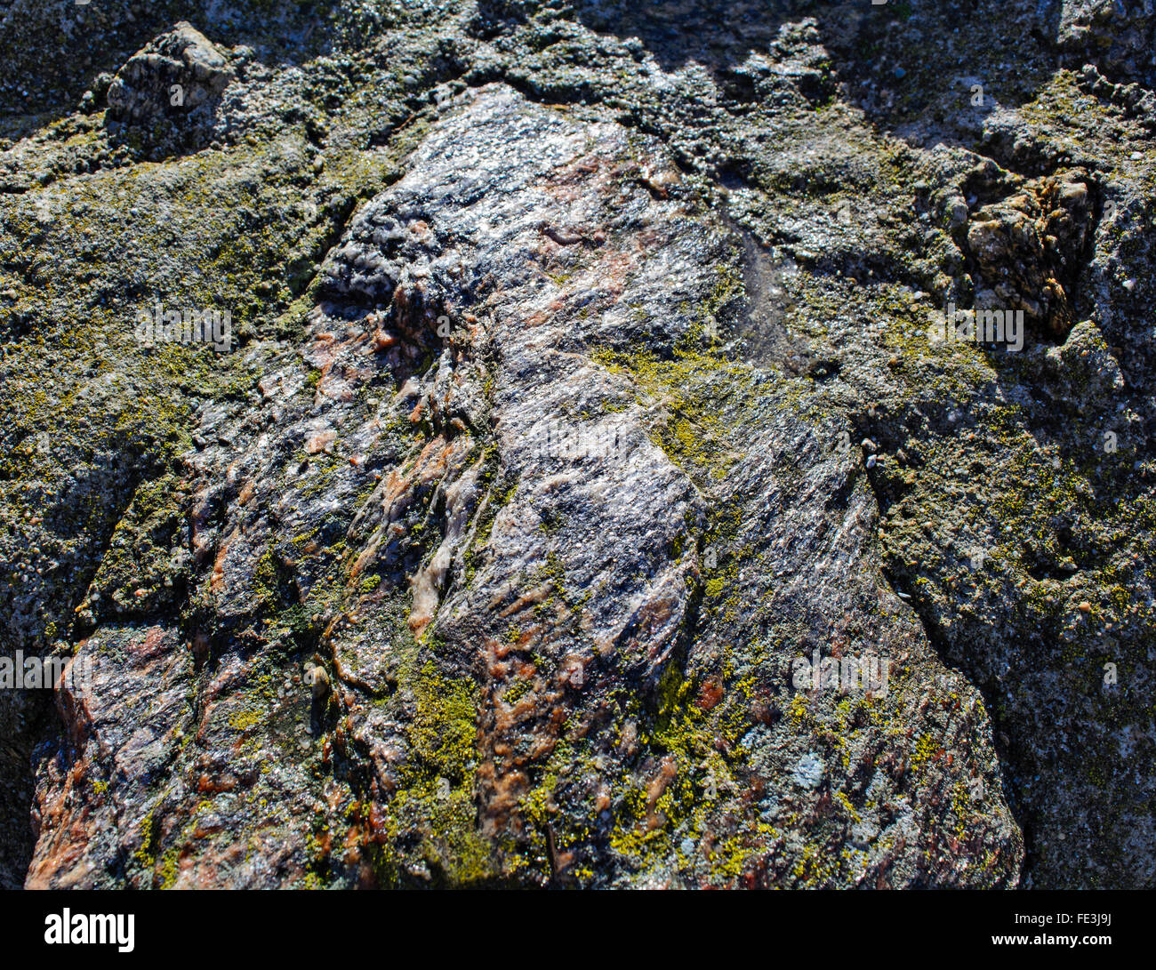 Medieval Rocks Color A piece of rock embedded in the old medieval wall Stock Photo - Alamy