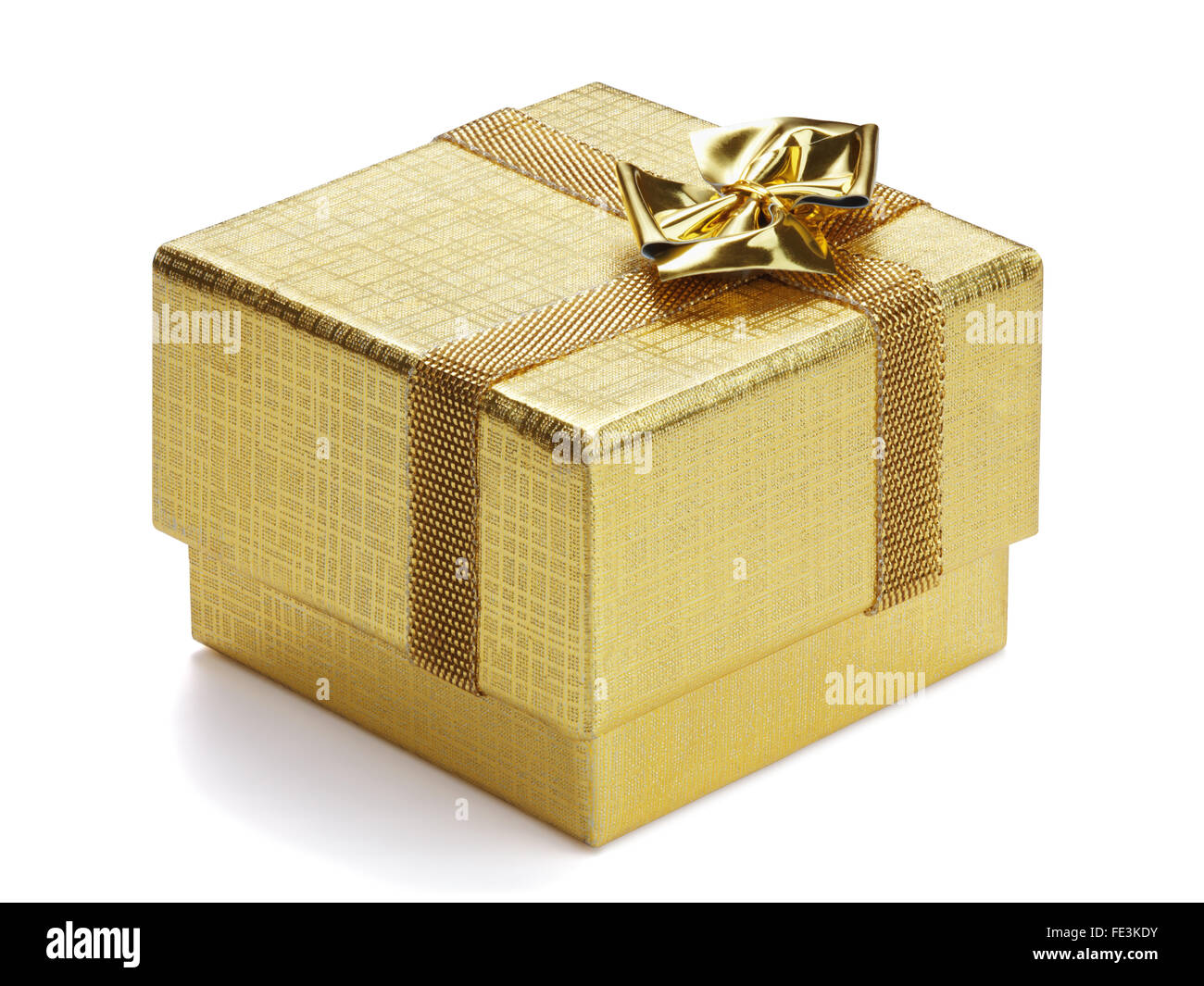 Golden gift box with ribbon and bow isolated on the white background ...
