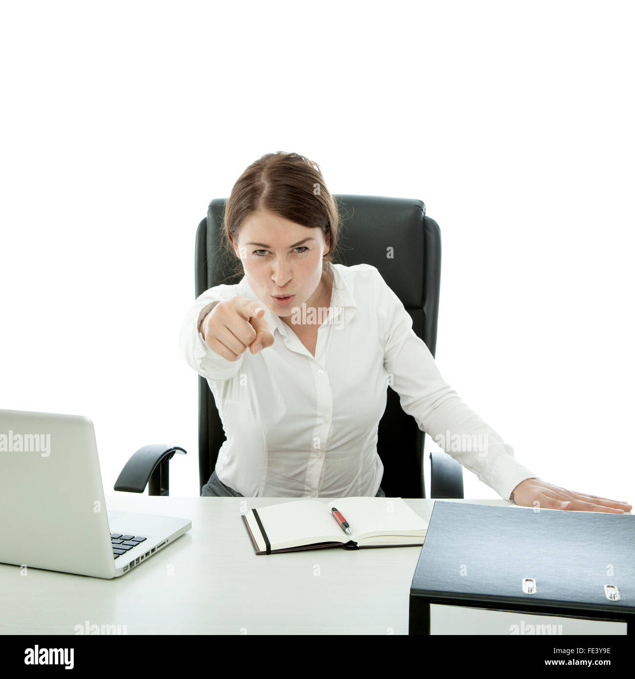 Young Brunette Business Woman Want You Behind Her Desk Stock Photo