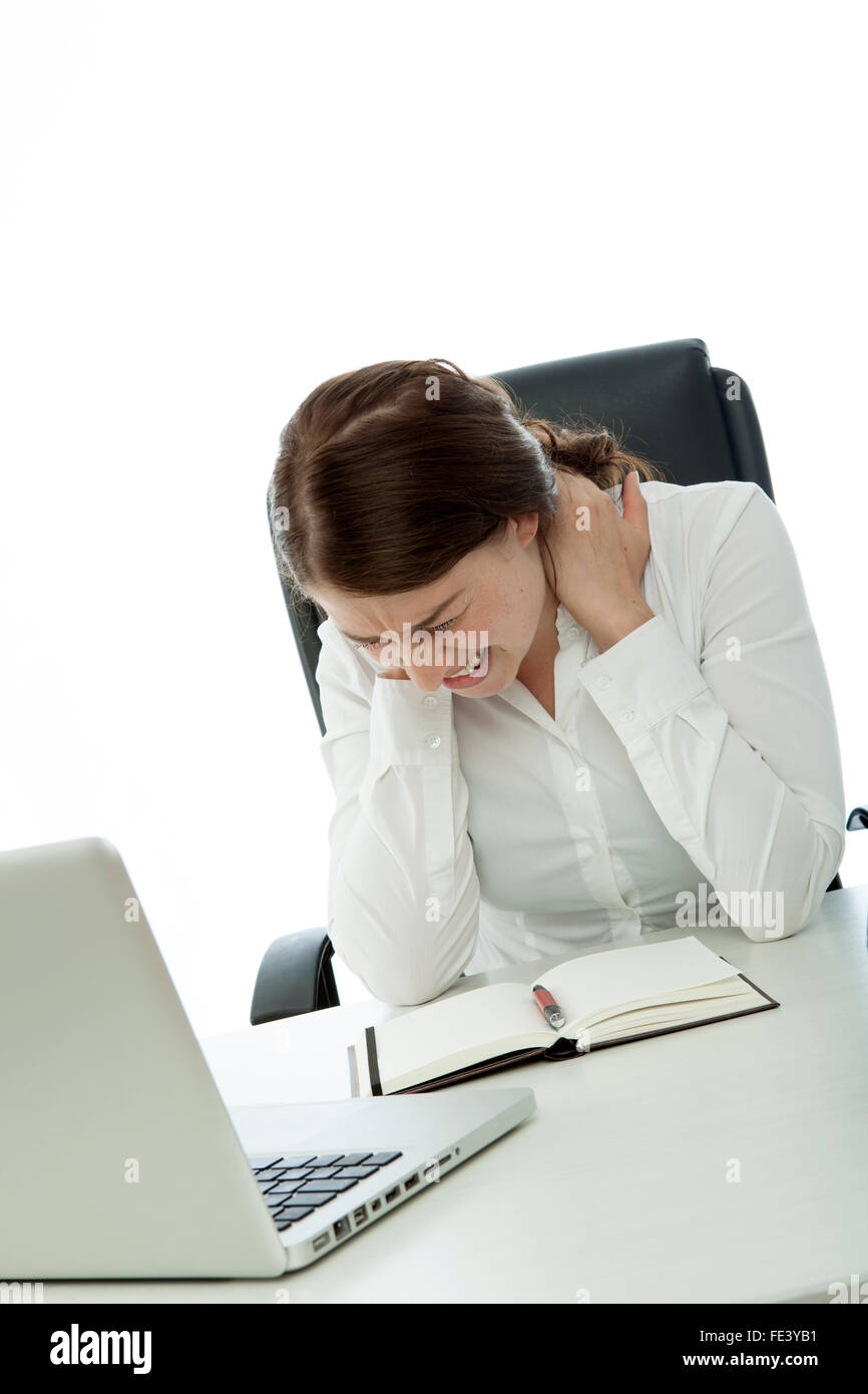 young brunette business woman neck pain on desk Stock Photo - Alamy