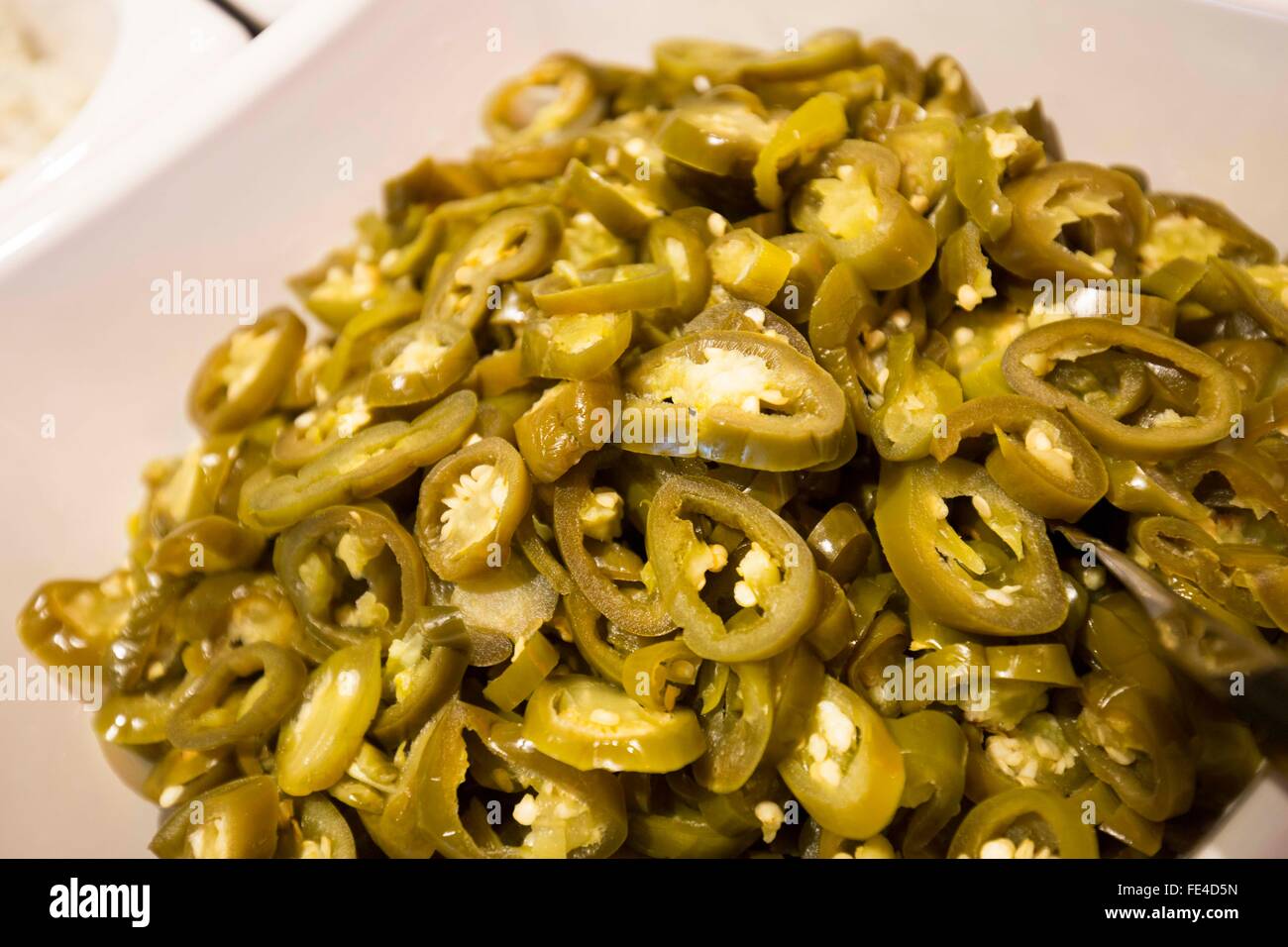 jalapeño peppers in a bowl in a restaurant     www.chrisbullphotographer.com Stock Photo