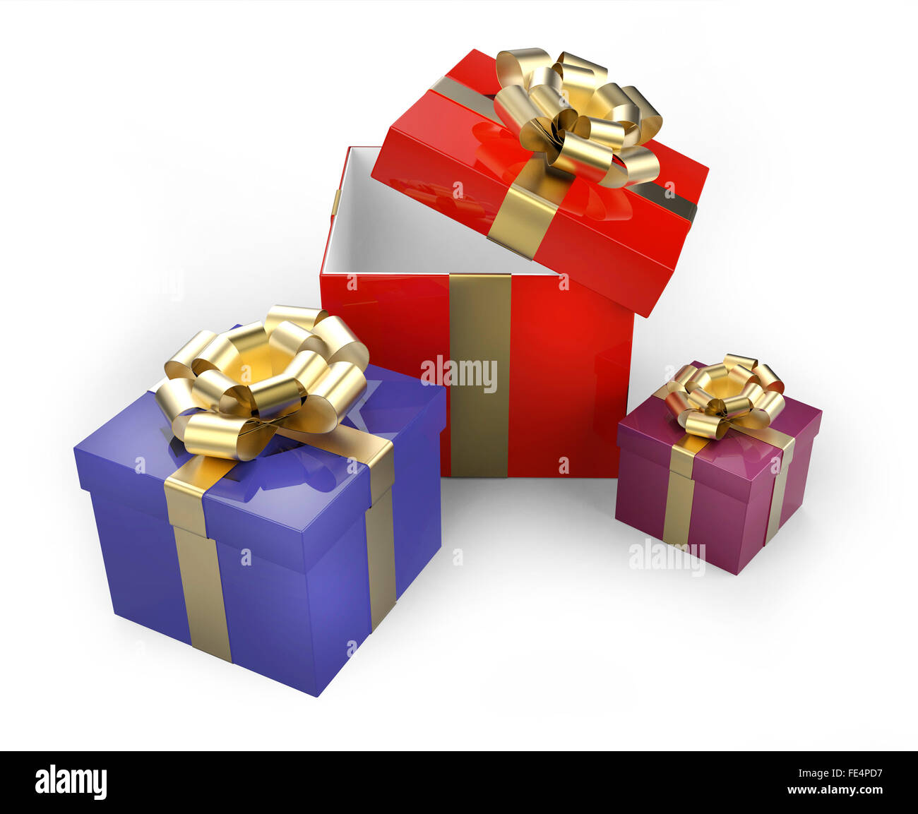 Gift boxes with gold ribbons and bows Stock Photo - Alamy