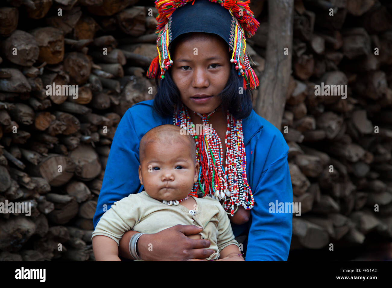 Lao Theung ethnic women and here child in a small village in a mountain on a north Laos close to the China borderline Stock Photo