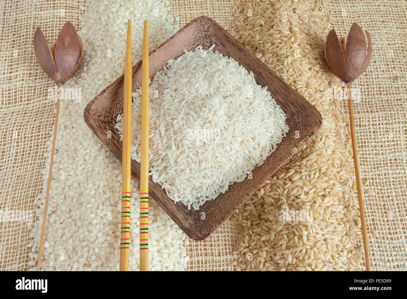 Ribe Rice Uncooked Minerbe, Ribe and Basmati rice in a wooden cup Stock Photo - Alamy