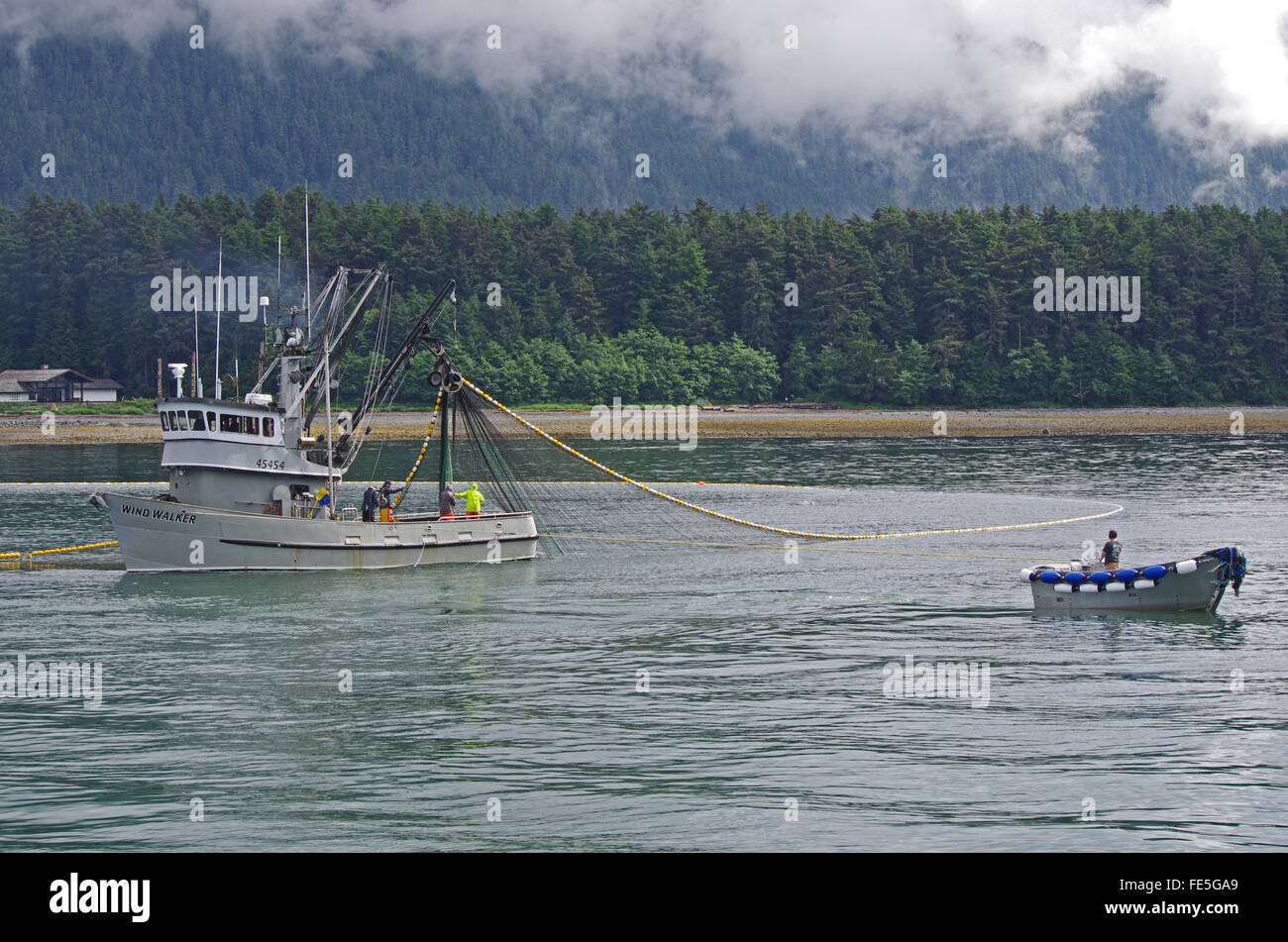 Fishing boat setting a seine net fishing for Salmon off of the