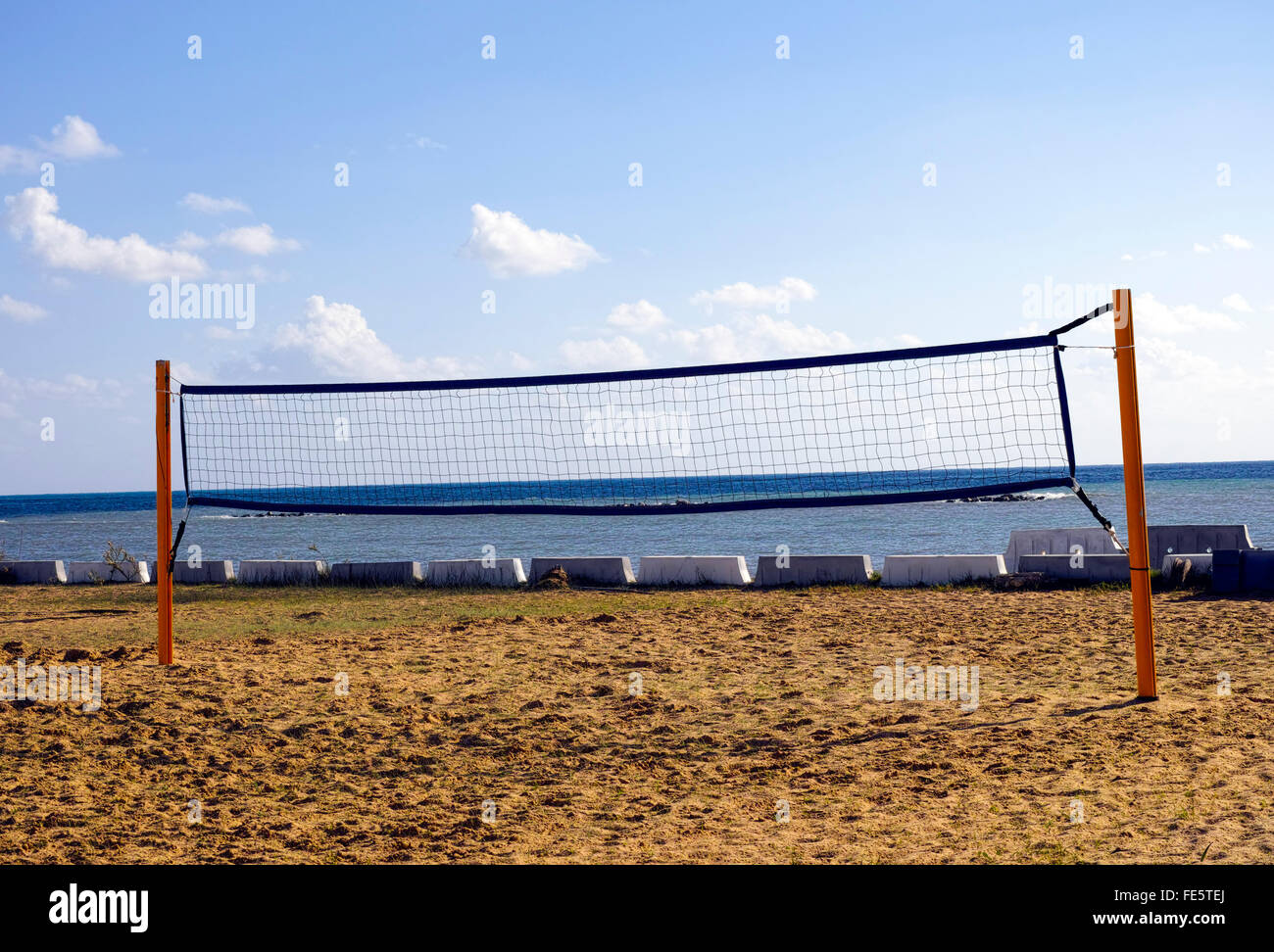 Beach volleyball net with sky and sea behind Stock Photo Alamy