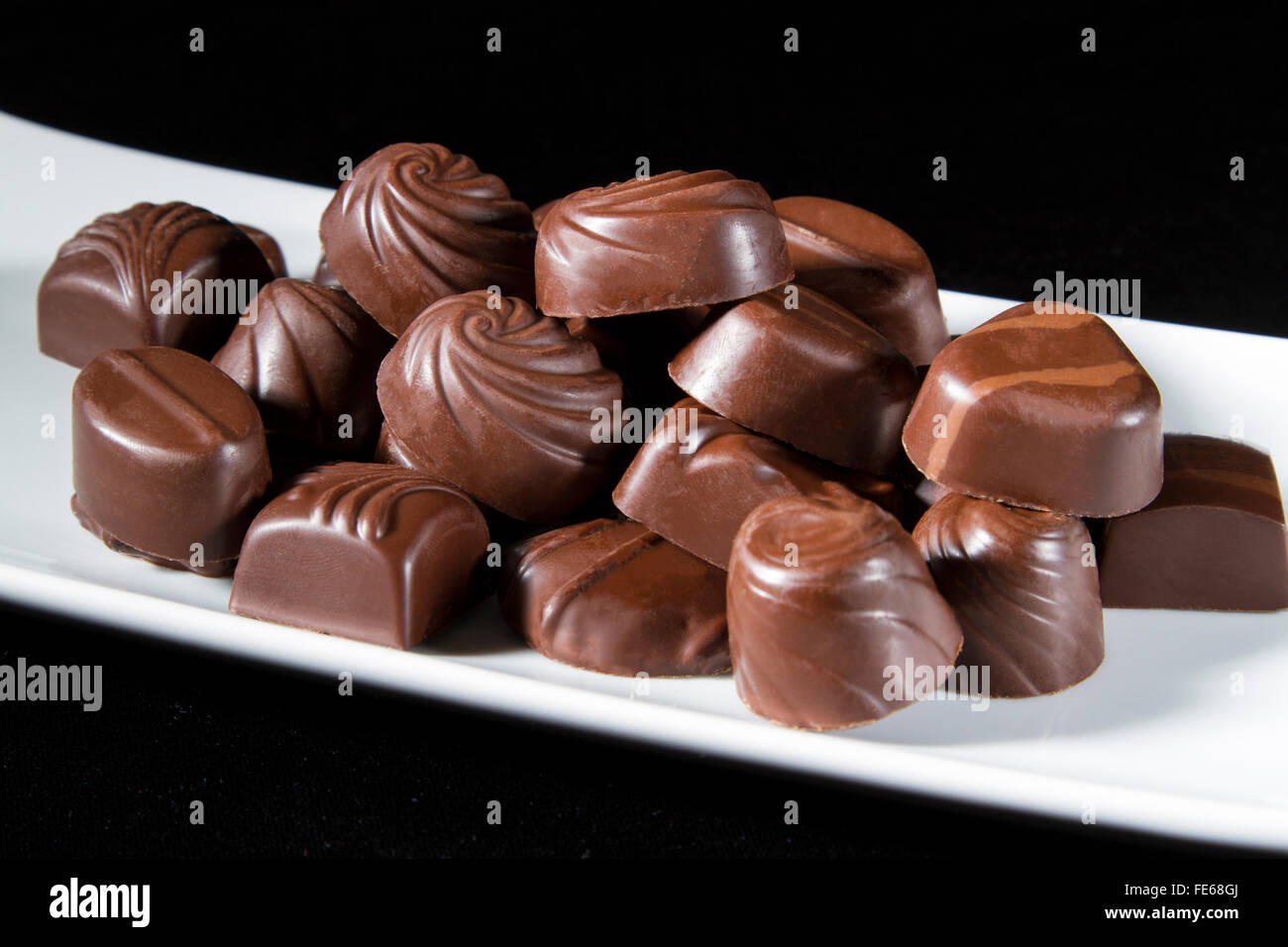 A plate of chocolate candy Stock Photo Alamy — free download