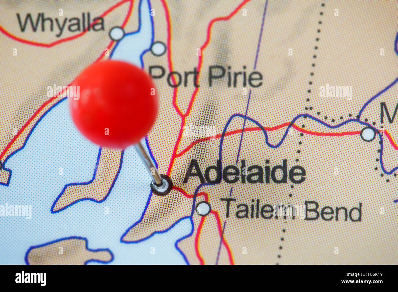 Close-up of a red pushpin in a map of Adelaide, Australia. Stock Photo