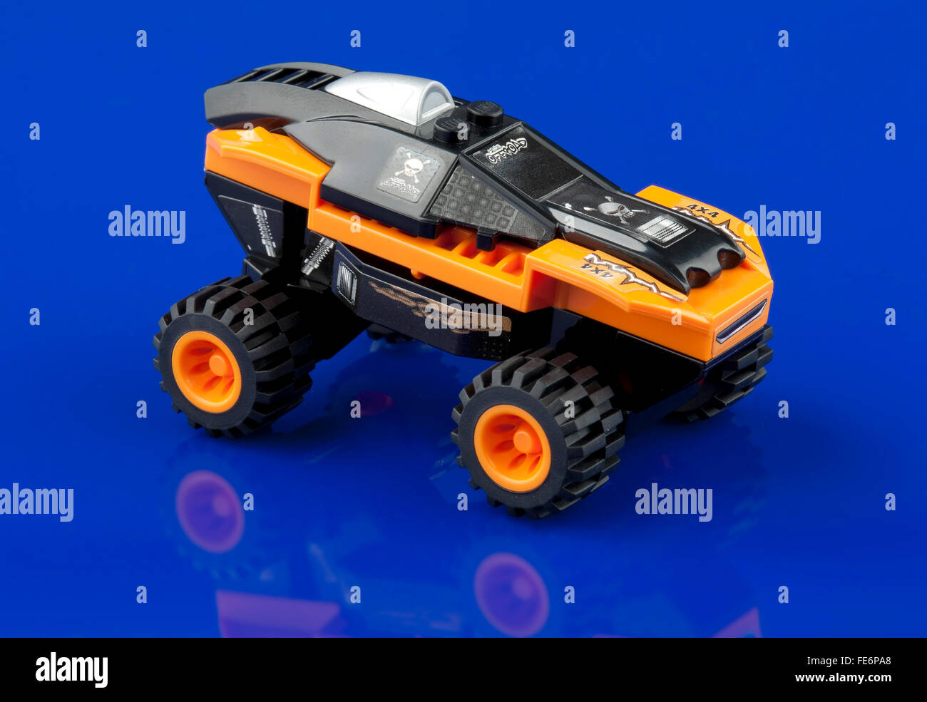 Lego racer toy car on blue background Stock Photo