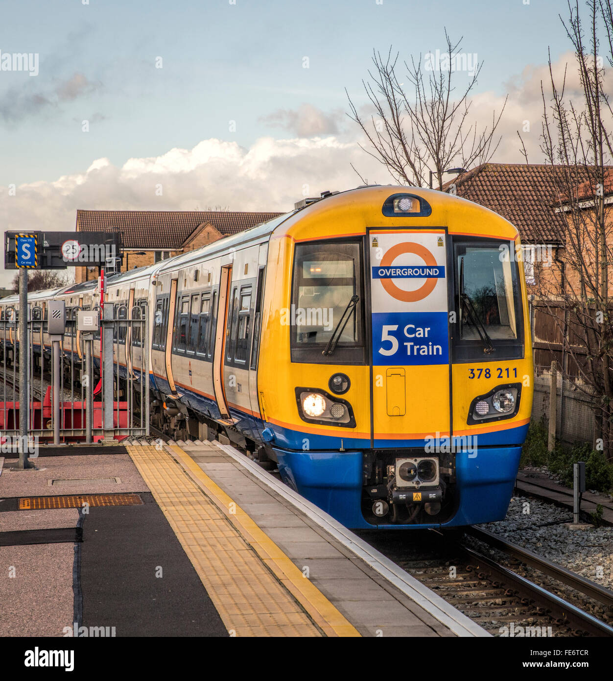 Overground train at New Cross Gate in London arriving at the platform Stock Photo