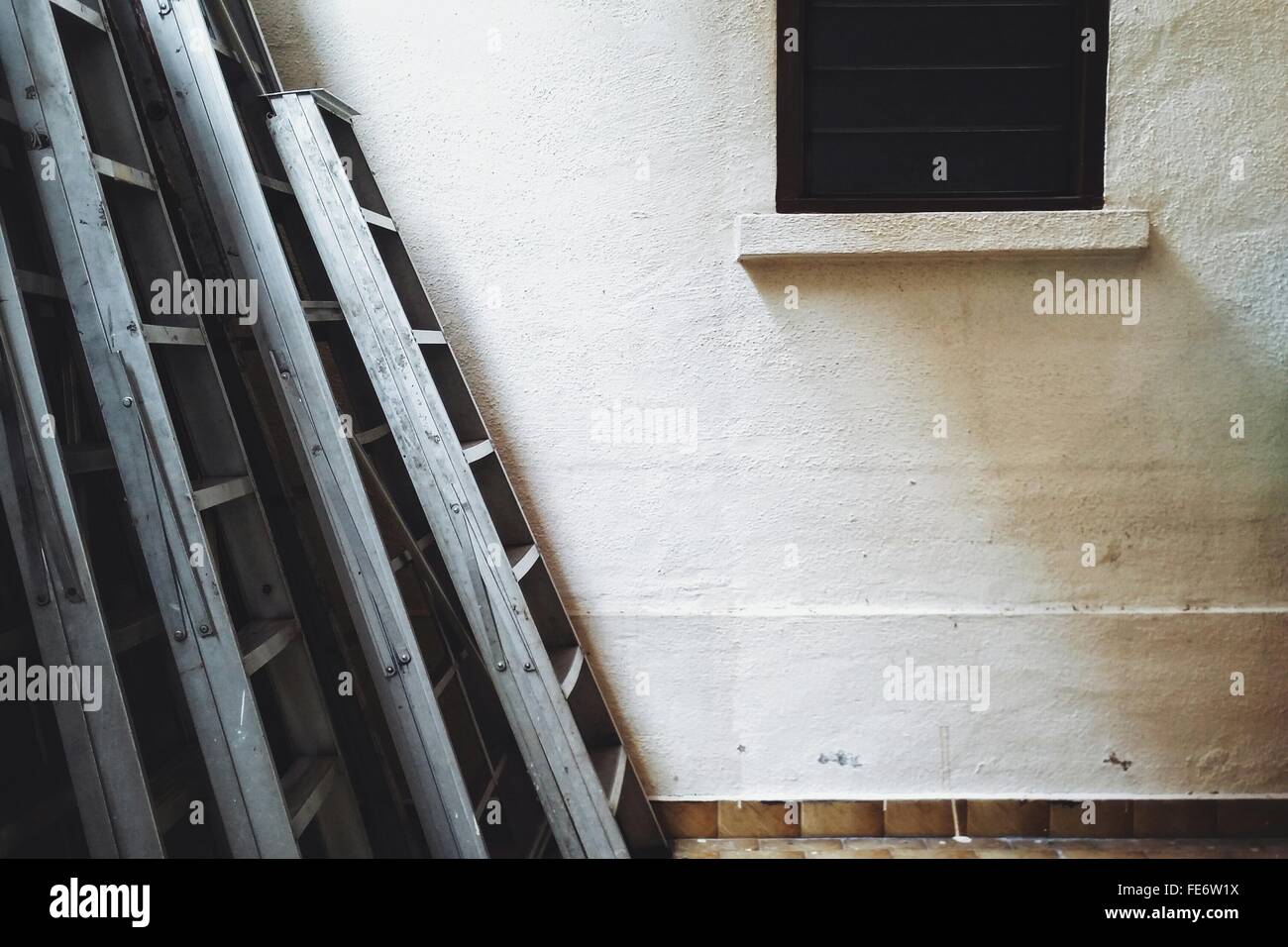 Ladders Outside House Stock Photo Alamy
