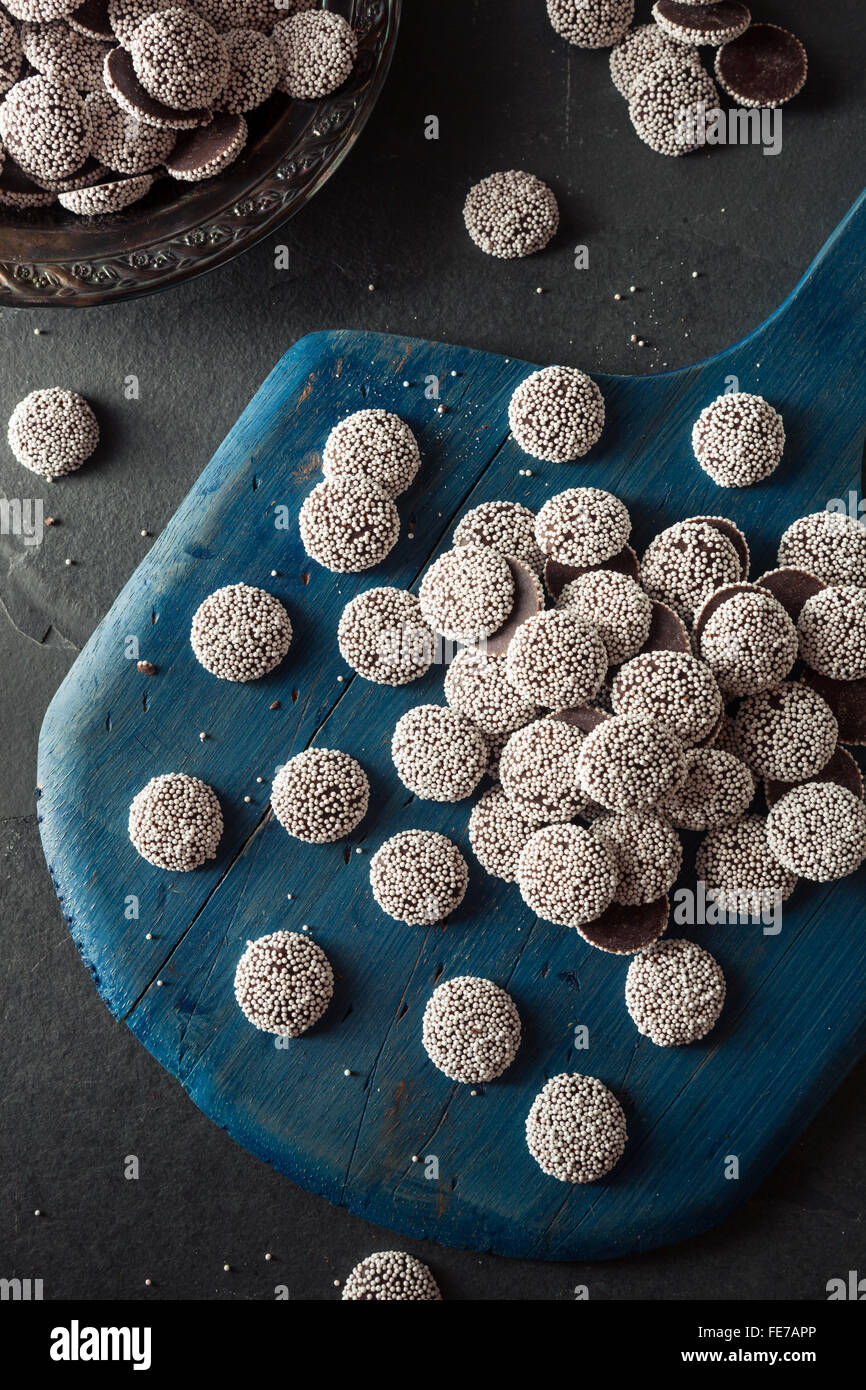 Sweet Homemade Dark Chocolate Nonpareils with White Sprinkles Stock