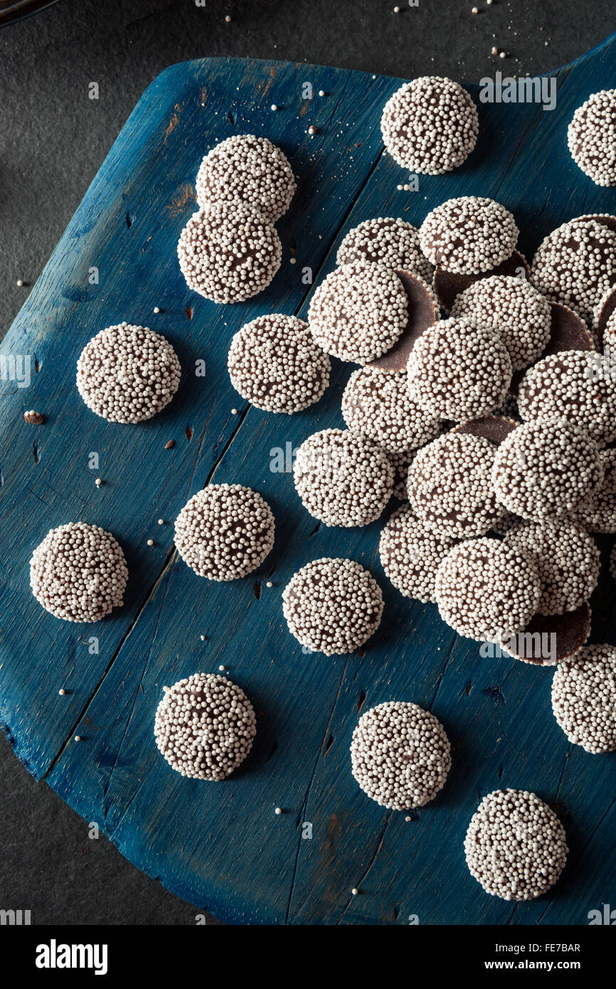 Sweet Homemade Dark Chocolate Nonpareils with White Sprinkles Stock