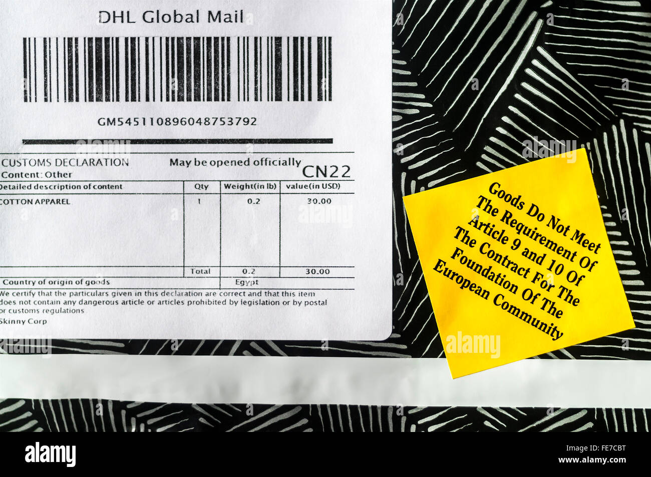 Regulation notice on foreign package of goods. Stock Photo