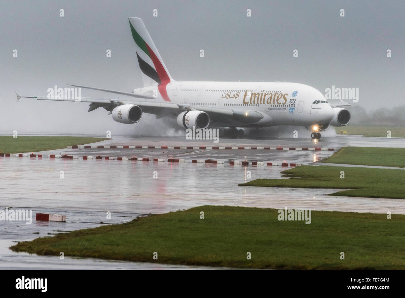Emirates Airbus A380-800 in the wet at Manchester airport. Stock Photo